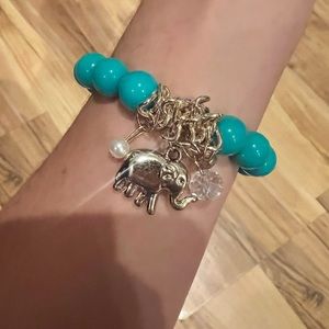 Teal beaded bracelet with elephant charm
